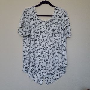 White blouse with black lettering